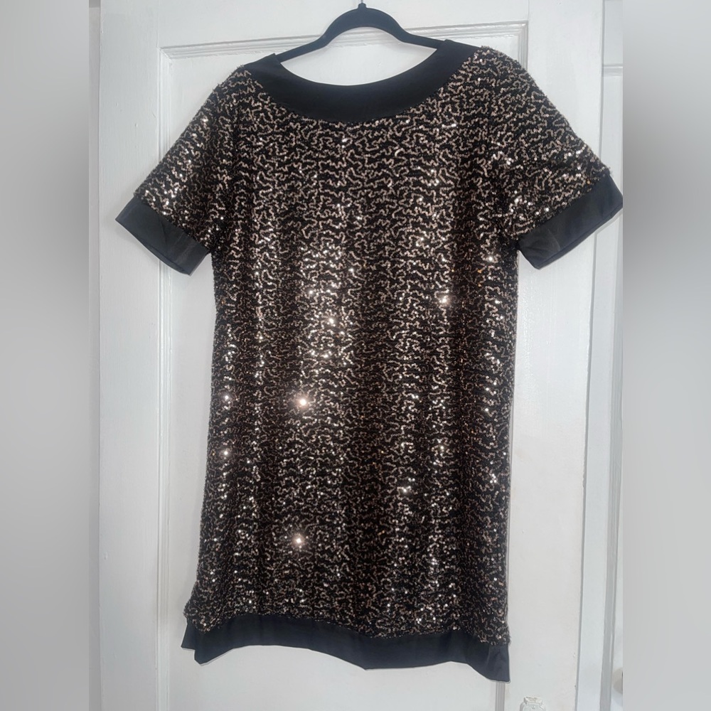 Never been worn, black, sequin loose dress.